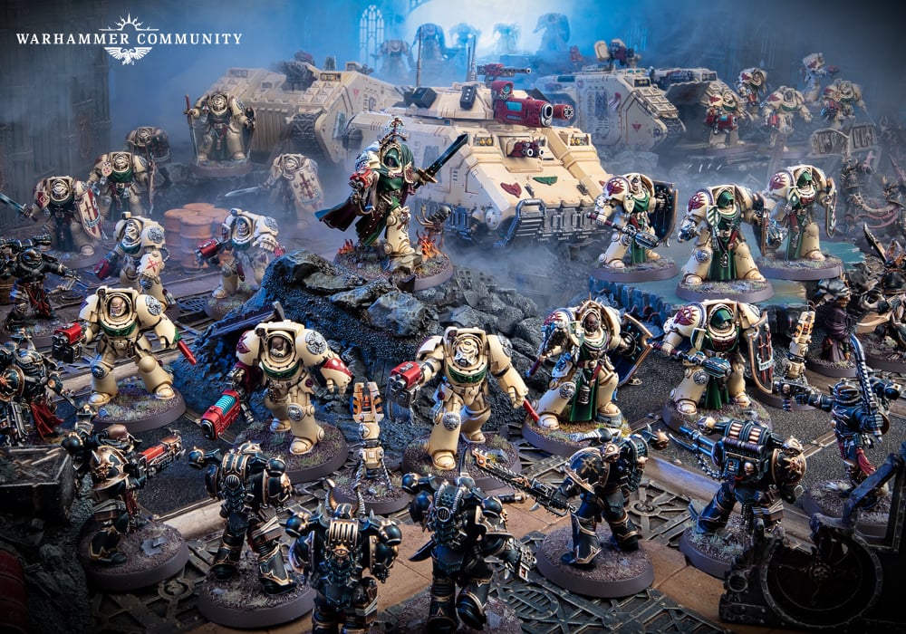 Miniatures from the Warhammer 40K Deathwing Assault Box Set battling an army of Genestealer miniattures.