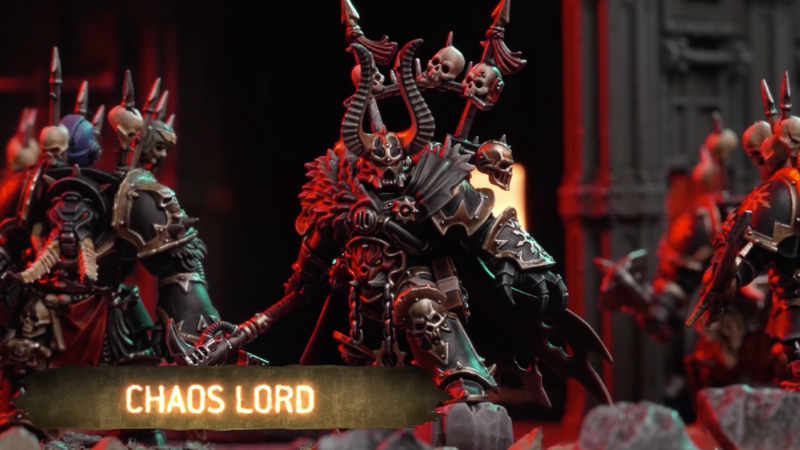 A shot of the new painted 2024 Chaos Lord model on a Warhammer 40K battlefield.